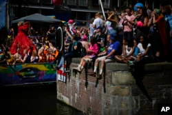 Huge Crowds Watch Amsterdam Pride's Canal Parade Celebration