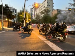 Iran Riot Police Confronting Protesters in Tehran Over Death of Woman