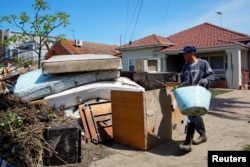 As Australia Expects More Rain, Flood Warnings Continue 