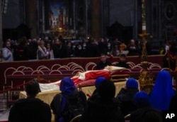 Tens of Thousands Pay Their Respects to Pope Benedict