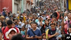 Migrants Walking Through Mexico Threaten Road Blockades