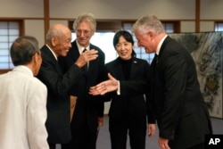 Flag Japanese Soldier Carried in WWII Returns From US