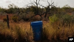 Barrels of Drinking Water for Migrants Walking Through Texas Have Disappeared