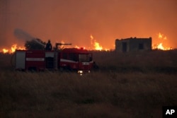 Major Wildfires Burn in Greece, Spain's Canary Island of Tenerife