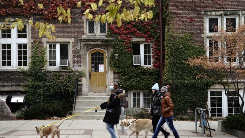 Enrollments Are Down, Budgets Are Tight; One College's Answer: Pizza-Carrying Robots