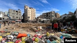 Calls for Gaza Cease-Fire Grow as Israel Vows to Dismantle Hamas