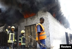 Official, Witnesses: Explosives Likely Started Mogadishu Market Fire