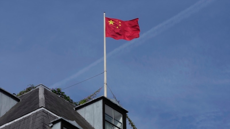 British officials charge 2 with spying for China