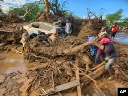 Dozens killed as dam bursts in Kenya following devastating rains