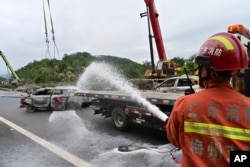 Death toll reaches 48 in China highway collapse