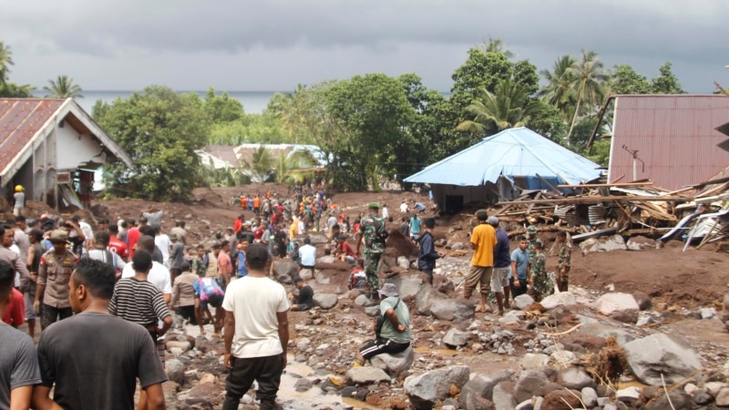 A flash flood on Indonesia's eastern Ternate Island sweeps away buildings and leaves 13 dead 