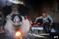 Fragile but unbroken, Afghan glassblowers refuse to quit