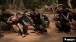 In Myanmar's jungles, young volunteers train hard to fight junta