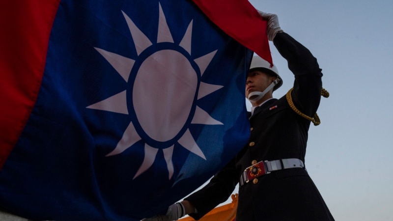 Taiwan sentences 8 military officers to prison for spying for China