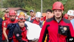 International rescue teams arrive in Bosnia after devastating floods and landslides 