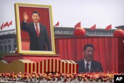 China marks 75 years of Communist Party rule as economic challenges and security threats linger  